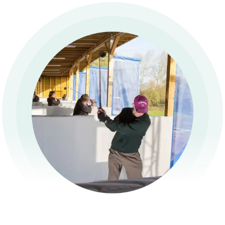 Image of a golfer during practice at Cheshunt Golf Park driving range